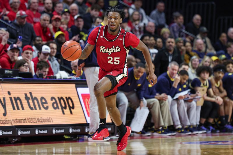 Feb 29, 2024; Piscataway, New Jersey, USA; Rutgers Scarlet Knights guard Jeremiah Williams (25) dribbles up court during the second half against the Michigan Wolverines at Jersey Mike's Arena. Mandatory Credit: Vincent Carchietta-USA TODAY Sports