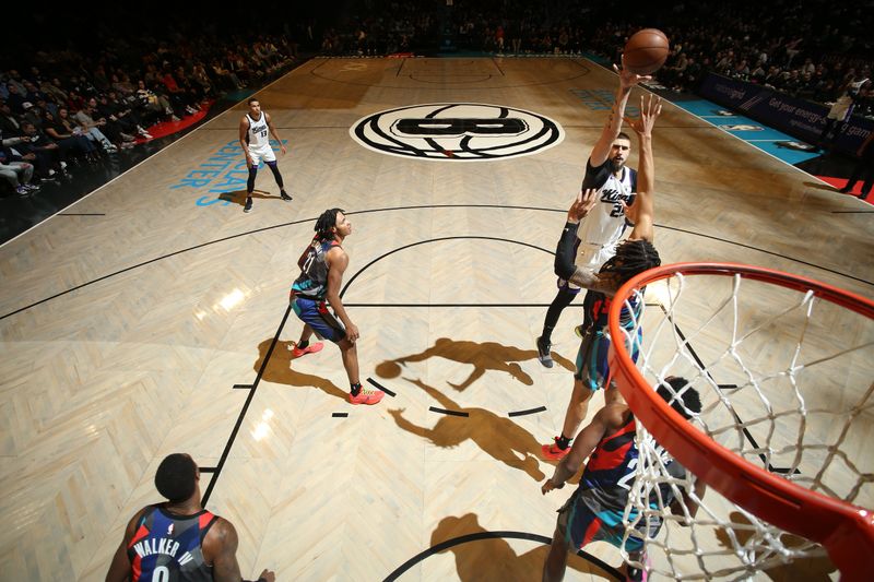 BROOKLYN, NY - APRIL 7: Alex Len #25 of the Sacramento Kings shoots the ball during the game against the Brooklyn Nets on April 7, 2024 at Barclays Center in Brooklyn, New York. NOTE TO USER: User expressly acknowledges and agrees that, by downloading and or using this Photograph, user is consenting to the terms and conditions of the Getty Images License Agreement. Mandatory Copyright Notice: Copyright 2024 NBAE (Photo by Nathaniel S. Butler/NBAE via Getty Images)