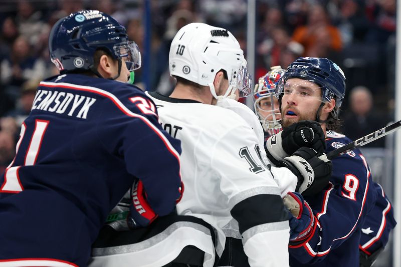 Jan 25, 2025; Columbus, Ohio, USA; Los Angeles Kings left wing Tanner Jeannot (10) talks with Columbus Blue Jackets defenseman Ivan Provorov (9) during the third period at Nationwide Arena. Mandatory Credit: Joseph Maiorana-Imagn Images