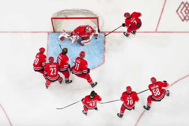 Oct 26, 2023; Raleigh, North Carolina, USA; Carolina Hurricanes players warmups up before the game against the Seattle Kraken at PNC Arena. Mandatory Credit: James Guillory-USA TODAY Sports