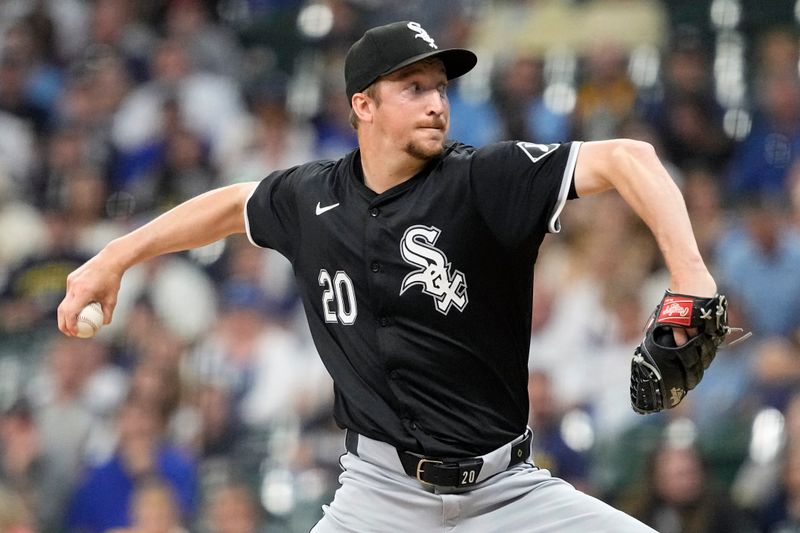 May 31, 2024; Milwaukee, Wisconsin, USA;  Chicago White Sox pitcher Erick Fedde (20) throws a pitch during the first inning against the Milwaukee Brewers at American Family Field. Mandatory Credit: Jeff Hanisch-USA TODAY Sports