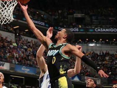 INDIANAPOLIS, IN - DECEMBER 23:  Tyrese Haliburton #0 of the Indiana Pacers handles the ball during the game against the Orlando Magic on December 23, 2023 at Gainbridge Fieldhouse in Indianapolis, Indiana. NOTE TO USER: User expressly acknowledges and agrees that, by downloading and or using this Photograph, user is consenting to the terms and conditions of the Getty Images License Agreement. Mandatory Copyright Notice: Copyright 2023 NBAE (Photo by Pepper Robinson/NBAE via Getty Images)