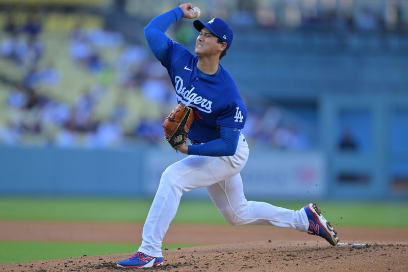 Mar 24, 2026; Los Angeles, California, USA;  Los Angeles Dodgers two-way player Shohei Ohtani (17) delivers to the plate in the second inning against the Los Angeles Angels at Dodger Stadium. Mandatory Credit: Jayne Kamin-Oncea-Imagn Images