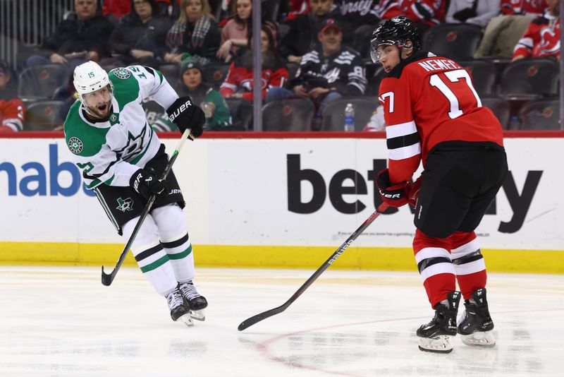 Jan 20, 2024; Newark, New Jersey, USA; Dallas Stars center Craig Smith (15) shoots the puck against the New Jersey Devils during the third period at Prudential Center. Mandatory Credit: Ed Mulholland-USA TODAY Sports