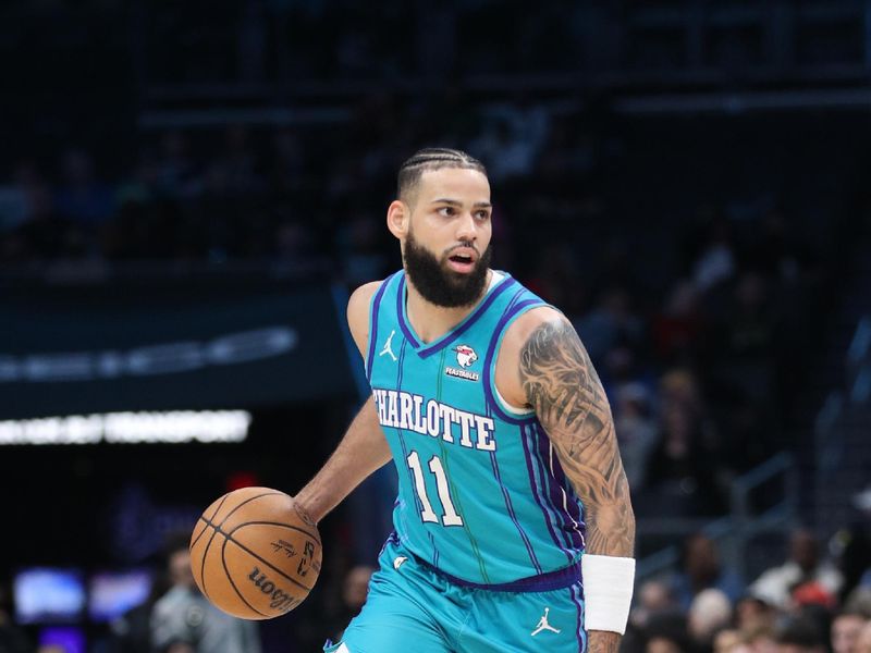 CHARLOTTE, NC - FEBRUARY 10:  Cody Martin #11 of the Charlotte Hornets handles the ball during the game  on February 10, 2024 at Spectrum Center in Charlotte, North Carolina. NOTE TO USER: User expressly acknowledges and agrees that, by downloading and or using this photograph, User is consenting to the terms and conditions of the Getty Images License Agreement.  Mandatory Copyright Notice:  Copyright 2024 NBAE (Photo by Brock Williams-Smith/NBAE via Getty Images)