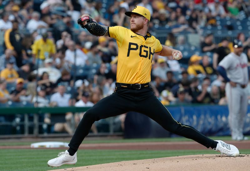 May 24, 2024; Pittsburgh, Pennsylvania, USA;  Pittsburgh Pirates starting pitcher Bailey Falter (26) delivers a pitch against the Atlanta Braves during the first inning at PNC Park. Mandatory Credit: Charles LeClaire-USA TODAY Sports