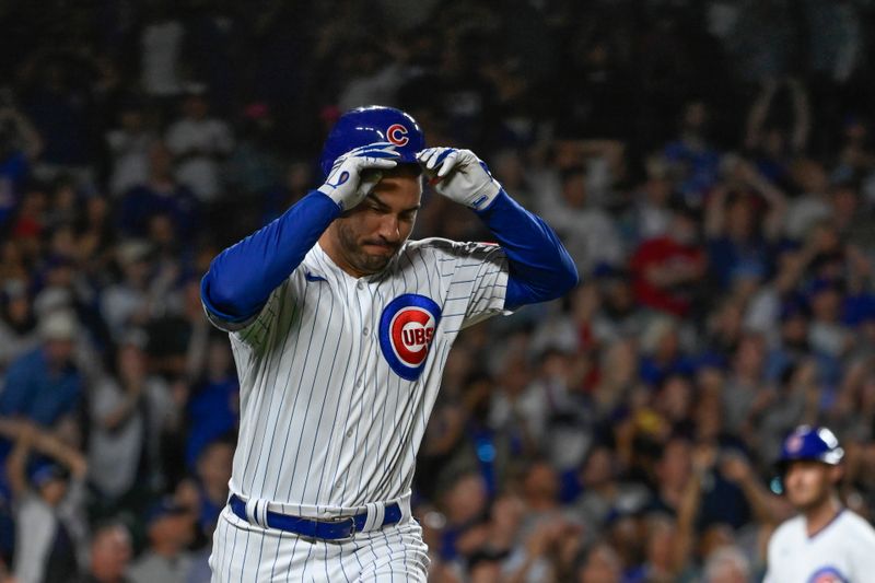 Jul 17, 2023; Chicago, Illinois, USA;  Chicago Cubs center fielder Mike Tauchman (40) throws his hat after lining out against the Washington Nationals during the eighth inning at Wrigley Field. Mandatory Credit: Matt Marton-USA TODAY Sports