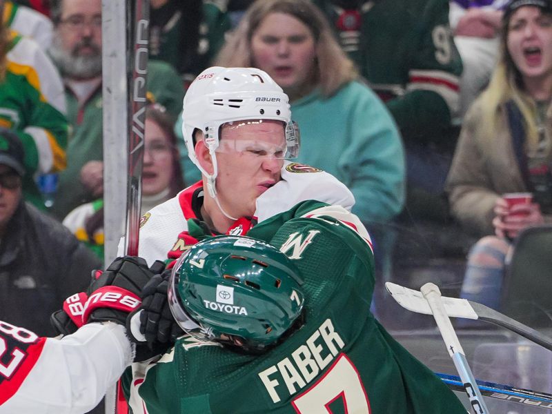 Apr 2, 2024; Saint Paul, Minnesota, USA; Ottawa Senators left wing Brady Tkachuk (7) punches Minnesota Wild defenseman Brock Faber (7) in the third period at Xcel Energy Center. Mandatory Credit: Brad Rempel-USA TODAY Sports