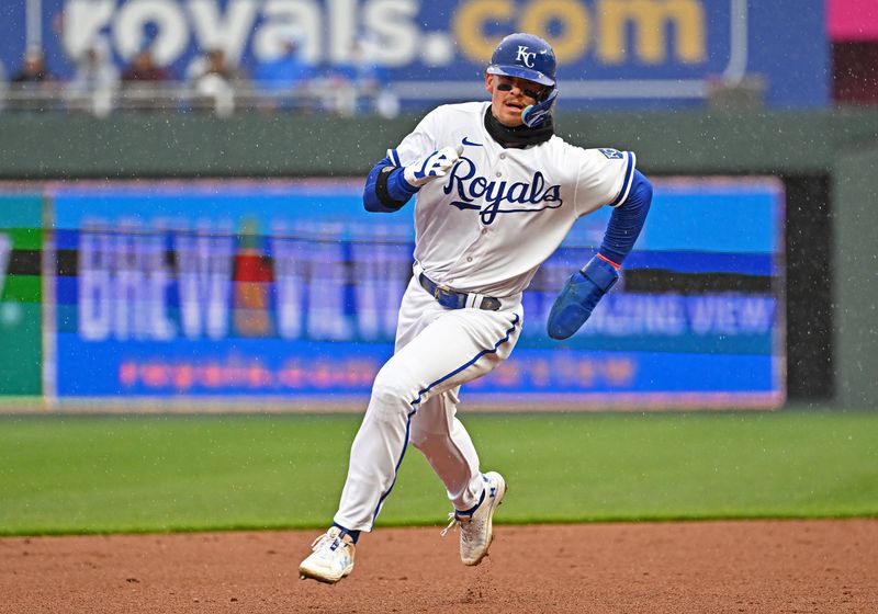 Apr 15, 2023; Kansas City, Missouri, USA;  Kansas City Royals shortstop Bobby Witt Jr. (7) rounds second base to score a run during the first inning against the Atlanta Braves at Kauffman Stadium. Mandatory Credit: Peter Aiken-USA TODAY Sports