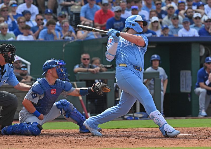 Jun 28, 2025; Kansas City, Missouri, USA;  Kansas City Royals first baseman Vinnie Pasquantino (9) hits a three-run home run in the fifth inning against the Los Angeles Dodgers at Kauffman Stadium. Mandatory Credit: Peter Aiken-Imagn Images