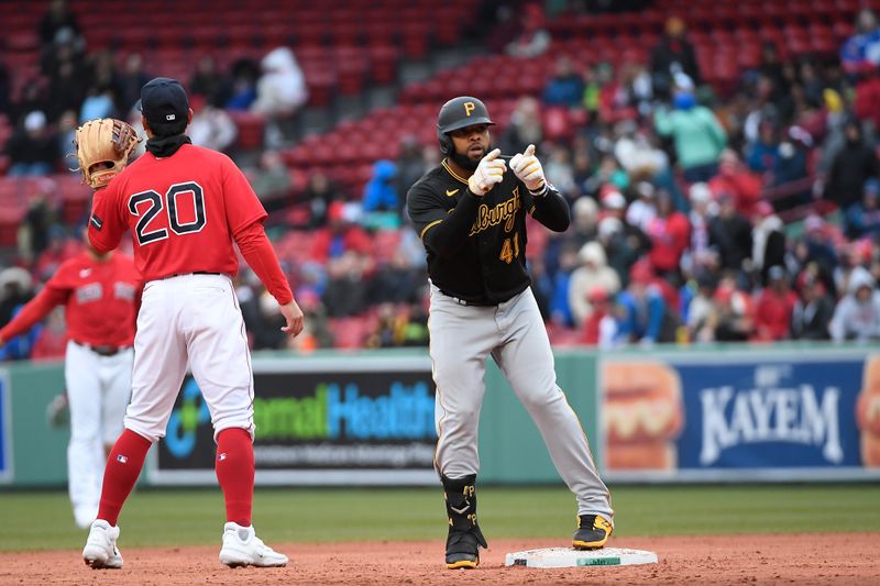 Apr 5, 2023; Boston, Massachusetts, USA; Pittsburgh Pirates first baseman Carlos Santana (41) reacts to his RBI single in the seventh inning against the Boston Red Sox at Fenway Park. Mandatory Credit: Eric Canha-USA TODAY Sports