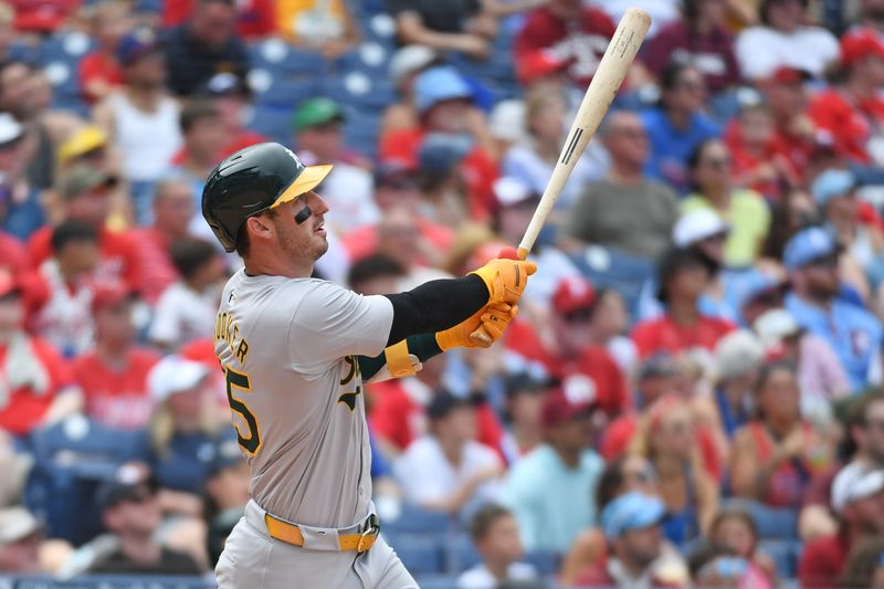 Jul 14, 2024; Philadelphia, Pennsylvania, USA; Oakland Athletics outfielder Brent Rooker (25) hits a two-run home run against the Philadelphia Phillies during the fourth inning at Citizens Bank Park. Mandatory Credit: Eric Hartline-USA TODAY Sports