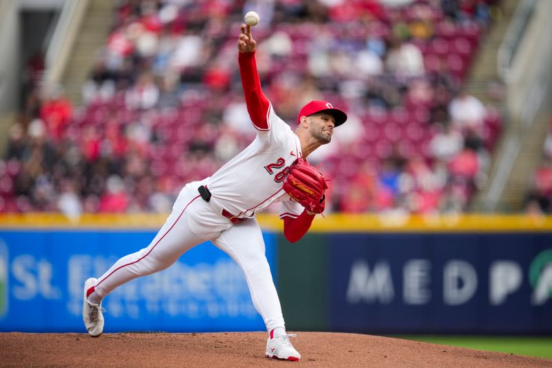 May 4, 2025; Cincinnati, Ohio, USA;  Cincinnati Reds pitcher Nick Martinez (28) throws against the Washington Nationals in the first inning inning at Great American Ball Park. Mandatory Credit: Aaron Doster-Imagn Images