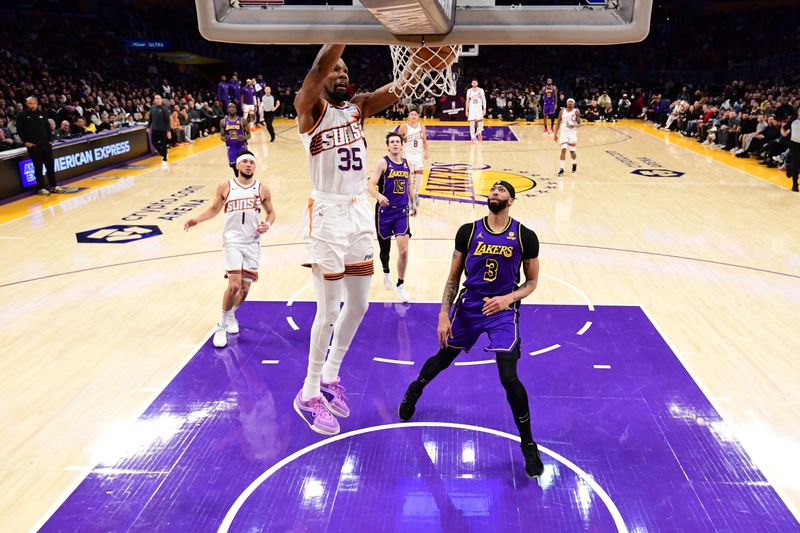 LOS ANGELES, CA - JANUARY 11: Kevin Durant #35 of the Phoenix Suns dunks the ball during the game against the Los Angeles Lakers on January 11, 2024 at Crypto.Com Arena in Los Angeles, California. NOTE TO USER: User expressly acknowledges and agrees that, by downloading and/or using this Photograph, user is consenting to the terms and conditions of the Getty Images License Agreement. Mandatory Copyright Notice: Copyright 2024 NBAE (Photo by Adam Pantozzi/NBAE via Getty Images)