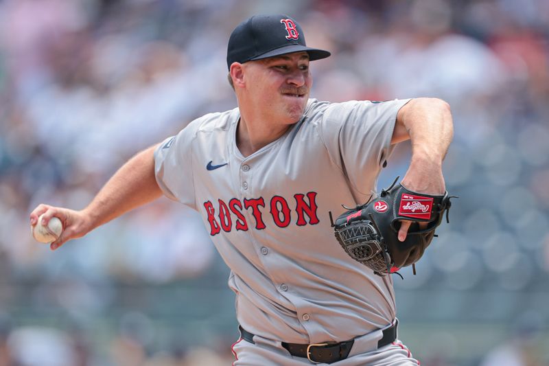 Jul 6, 2024; Bronx, New York, USA; Boston Red Sox relief pitcher Josh Winckowski (25) delivers a pitch during the first inning against the New York Yankees at Yankee Stadium. Mandatory Credit: Vincent Carchietta-USA TODAY Sports