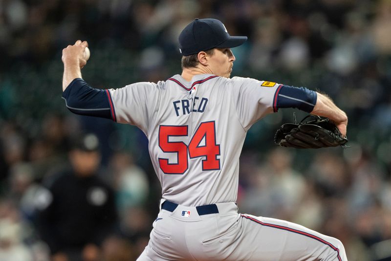 Apr 29, 2024; Seattle, Washington, USA; Atlanta Braves starter Max Fried (54) delivers a pitch during the first inning against the Seattle Mariners at T-Mobile Park. Mandatory Credit: Stephen Brashear-USA TODAY Sports