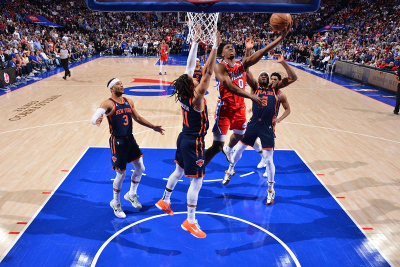 PHILADELPHIA, PA - APRIL 28: Tyrese Maxey #0 of the Philadelphia 76ers drives to the basket during the game against the New York Knicks during Round 1 Game 4 of the 2024 NBA Playoffs on April 28, 2024 at the Wells Fargo Center in Philadelphia, Pennsylvania NOTE TO USER: User expressly acknowledges and agrees that, by downloading and/or using this Photograph, user is consenting to the terms and conditions of the Getty Images License Agreement. Mandatory Copyright Notice: Copyright 2024 NBAE (Photo by Jesse D. Garrabrant/NBAE via Getty Images)