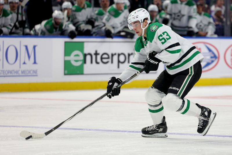 Oct 22, 2024; Buffalo, New York, USA;  Dallas Stars center Wyatt Johnston (53) skates up ice with the puck during the first period against the Buffalo Sabres at KeyBank Center. Mandatory Credit: Timothy T. Ludwig-Imagn Images