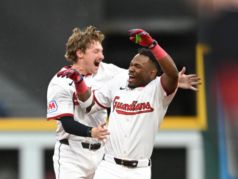 May 1, 2025; Cleveland, Ohio, USA; Cleveland Guardians center fielder Angel Martinez (1) celebrates with first baseman Kyle Manzardo (9) after hitting a game-winning RBI single during the tenth inning against the Minnesota Twins at Progressive Field. Mandatory Credit: Ken Blaze-Imagn Images

