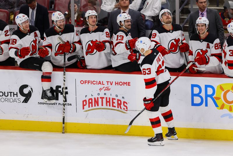 Nov 14, 2024; Sunrise, Florida, USA; New Jersey Devils left wing Jesper Bratt (63) celebrates after scoring against the Florida Panthers during the third period at Amerant Bank Arena. Mandatory Credit: Sam Navarro-Imagn Images