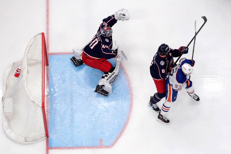 Mar 7, 2024; Columbus, Ohio, USA; Columbus Blue Jackets goalie Daniil Tarasov (40) makes a glove save during the first period against the Edmonton Oilers at Nationwide Arena. Mandatory Credit: Russell LaBounty-USA TODAY Sports