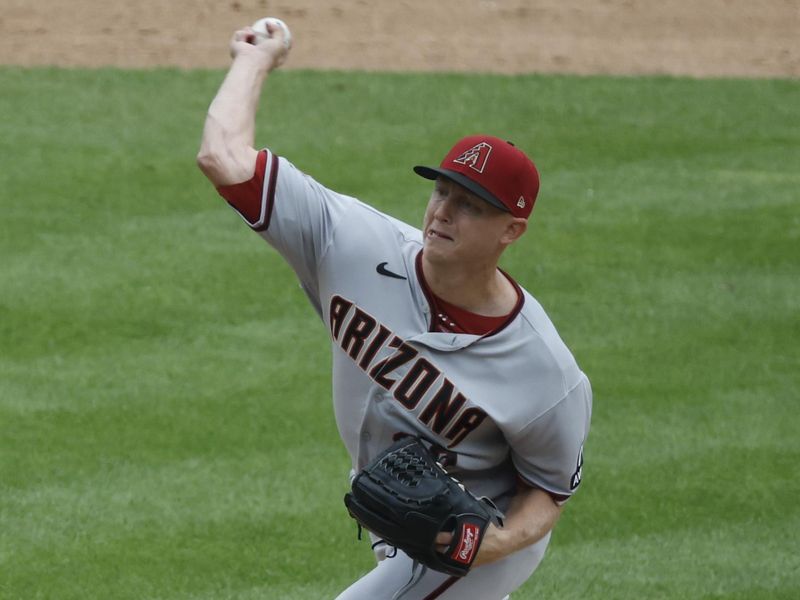 Jun 11, 2023; Detroit, Michigan, USA;  Arizona Diamondbacks relief pitcher Scott McGough (30) pitches in the ninth inning against the Detroit Tigers at Comerica Park. Mandatory Credit: Rick Osentoski-USA TODAY Sports