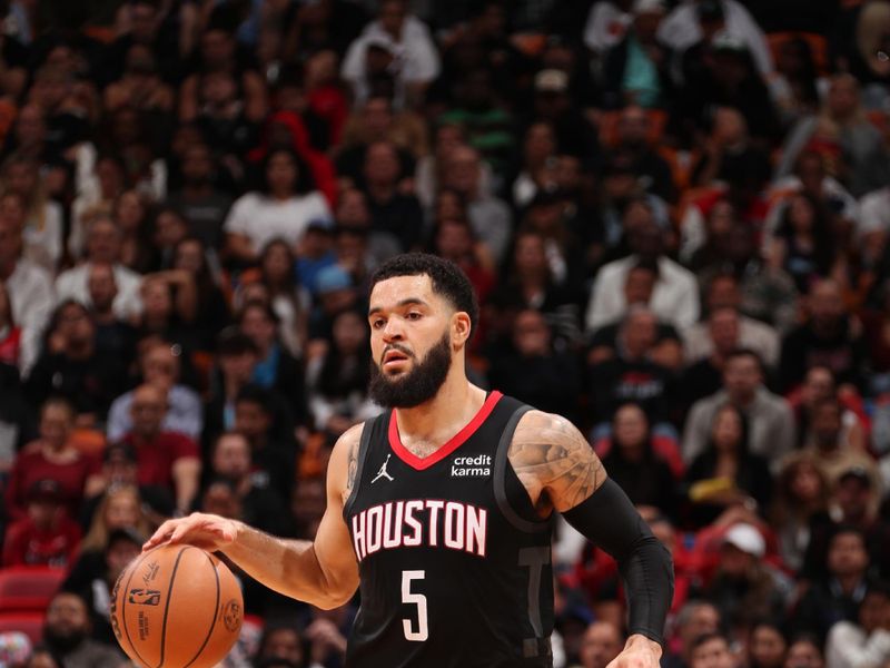 MIAMI, FL - JANUARY 8: Fred VanVleet #5 of the Houston Rockets brings the ball up court against the Miami Heat on January 8, 2024 at Kaseya Center in Miami, Florida. NOTE TO USER: User expressly acknowledges and agrees that, by downloading and or using this Photograph, user is consenting to the terms and conditions of the Getty Images License Agreement. Mandatory Copyright Notice: Copyright 2024 NBAE (Photo by Issac Baldizon/NBAE via Getty Images)