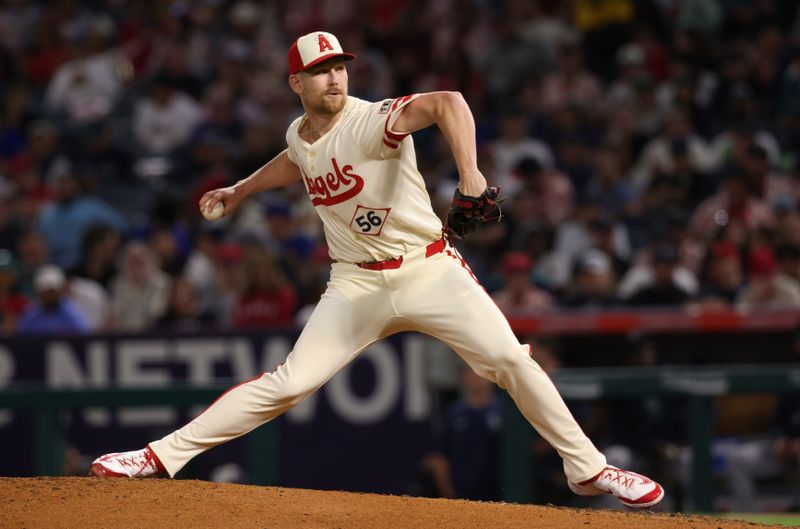 Jun 6, 2025; Anaheim, California, USA; Los Angeles Angels pitcher Ryan Zeferjahn (56) throws during the seventh inning against the Seattle Mariners at Angel Stadium. Mandatory Credit: Jason Parkhurst-Imagn Images
