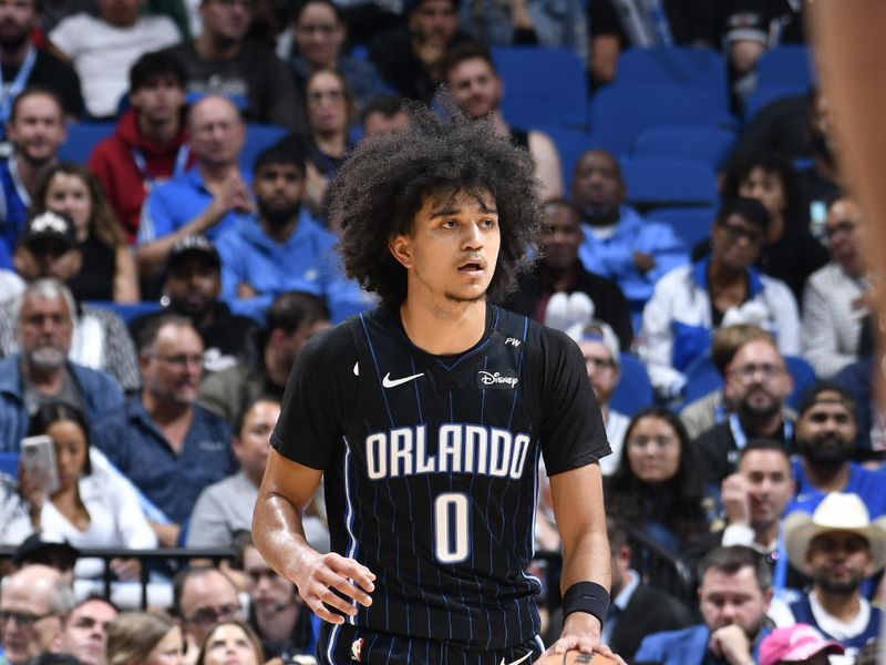 ORLANDO, FL - NOVEMBER 13: Anthony Black #0 of the Orlando Magic dribbles the ball during the game against the Indiana Pacers on November 13, 2024 at Kia Center in Orlando, Florida. NOTE TO USER: User expressly acknowledges and agrees that, by downloading and or using this photograph, User is consenting to the terms and conditions of the Getty Images License Agreement. Mandatory Copyright Notice: Copyright 2024 NBAE (Photo by Fernando Medina/NBAE via Getty Images)