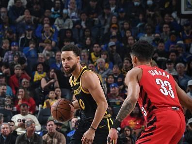 SAN FRANCISCO, CA - DECEMBER 23: Stephen Curry #30 of the Golden State Warriors dribbles the ball during the game against the Portland Trail Blazers on December 23, 2023 at Chase Center in San Francisco, California. NOTE TO USER: User expressly acknowledges and agrees that, by downloading and or using this photograph, user is consenting to the terms and conditions of Getty Images License Agreement. Mandatory Copyright Notice: Copyright 2023 NBAE (Photo by Noah Graham/NBAE via Getty Images)