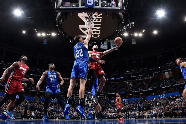 ORLANDO, FL - DECEMBER 20: Caleb Martin #16 of the Miami Heat drives to the basket during the game against the Orlando Magic on December 20, 2023 at the Kia Center in Orlando, Florida. NOTE TO USER: User expressly acknowledges and agrees that, by downloading and or using this photograph, User is consenting to the terms and conditions of the Getty Images License Agreement. Mandatory Copyright Notice: Copyright 2023 NBAE (Photo by Fernando Medina/NBAE via Getty Images)