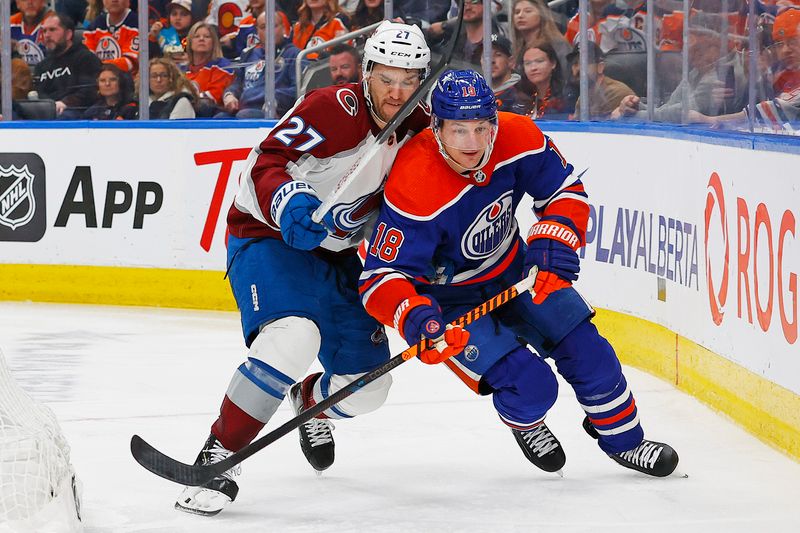 Mar 16, 2024; Edmonton, Alberta, CAN; Edmonton Oilers forward Zach Hyman (18) Battle along the boards for a loose puck during the third period at Rogers Place. Mandatory Credit: Perry Nelson-USA TODAY Sports