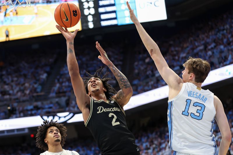 Jan 10, 2026; Chapel Hill, North Carolina, USA; Wake Forest Demon Deacons forward Juke Harris (2) shoots the ball against the Wake Forest Demon Deacons during the first half at Dean E. Smith Center. Mandatory Credit: Cory Knowlton-Imagn Images