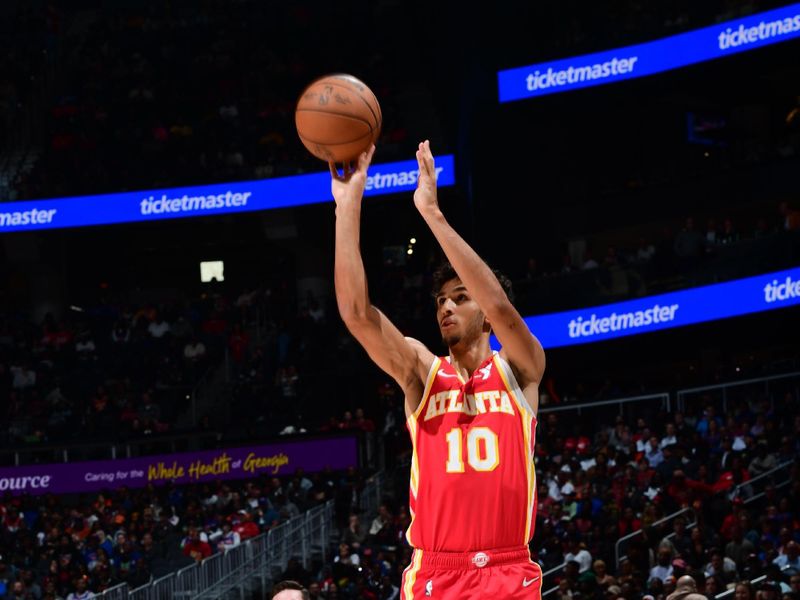 ATLANTA, GA - NOVEMBER 6: Zaccharie Risacher #10 of the Atlanta Hawks shoots the ball during the game against the New York Knicks during a regular season game on November 6, 2024 at State Farm Arena in Atlanta, Georgia.  NOTE TO USER: User expressly acknowledges and agrees that, by downloading and/or using this Photograph, user is consenting to the terms and conditions of the Getty Images License Agreement. Mandatory Copyright Notice: Copyright 2024 NBAE (Photo by Scott Cunningham/NBAE via Getty Images)