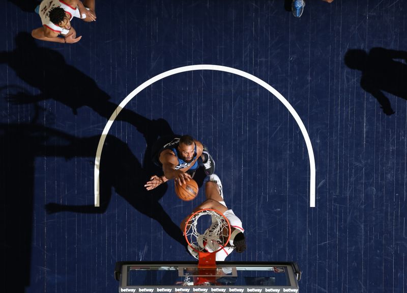 MINNEAPOLIS, MN -  MARCH 4: Rudy Gobert #27 of the Minnesota Timberwolves drives to the basket during the game against the Portland Trail Blazers on March 4, 2024 at Target Center in Minneapolis, Minnesota. NOTE TO USER: User expressly acknowledges and agrees that, by downloading and or using this Photograph, user is consenting to the terms and conditions of the Getty Images License Agreement. Mandatory Copyright Notice: Copyright 2024 NBAE (Photo by David Sherman/NBAE via Getty Images)