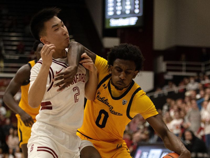 Jan 28, 2023; Stanford, California, USA; California Golden Bears guard Marsalis Roberson (0) tries to drive around Stanford Cardinal guard Roy Yuan (2) during the second half at Maples Pavilion. Stanford defeated California 75-46. Mandatory Credit: D. Ross Cameron-USA TODAY Sports