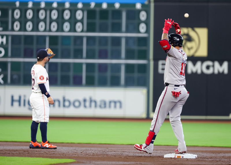 Apr 17, 2024; Houston, Texas, USA; Atlanta Braves shortstop Orlando Arcia (11) reacts to his stand up double against the Houston Astros in the second inning at Minute Maid Park. Mandatory Credit: Thomas Shea-USA TODAY Sports