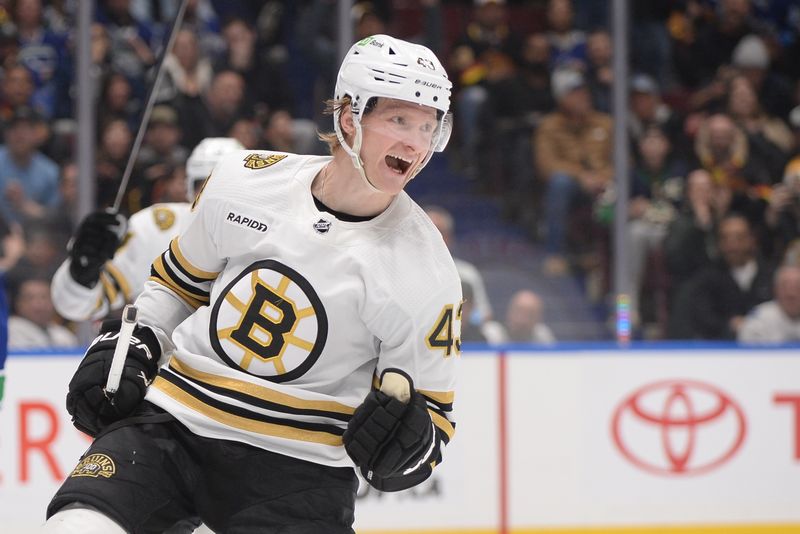 Feb 24, 2024; Vancouver, British Columbia, CAN;  Boston Bruins forward Danton Heinen (43) celebrates his goal during the second period against the Vancouver Canucks at Rogers Arena. Mandatory Credit: Anne-Marie Sorvin-USA TODAY Sports