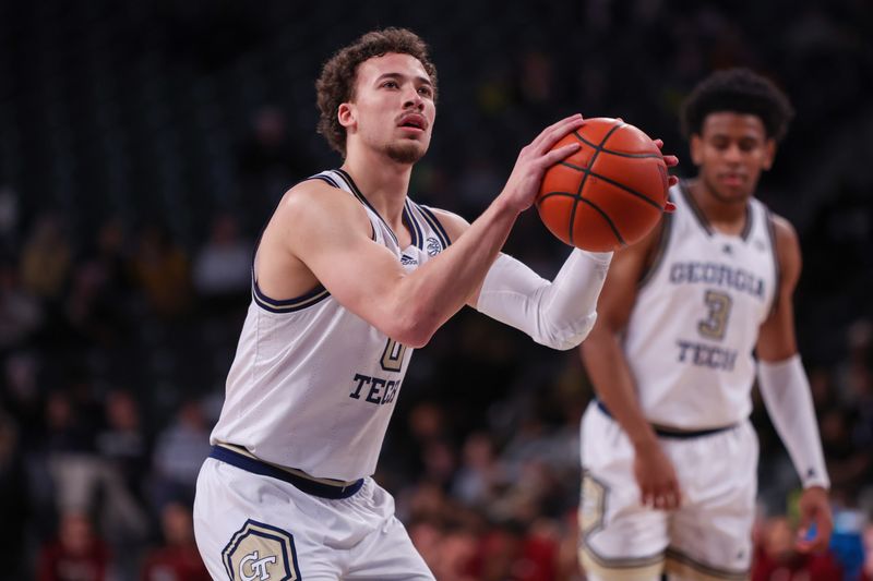 Jan 4, 2025; Atlanta, Georgia, USA; Georgia Tech Yellow Jackets guard Lance Terry (0) shoots a free throw against the Boston College Eagles in the second half at McCamish Pavilion. Mandatory Credit: Brett Davis-Imagn Images
