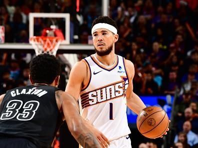 PHOENIX, AZ - DECEMBER 13: Devin Booker #1 of the Phoenix Suns dribbles the ball during the game against the Brooklyn Nets on December 13, 2023 at Footprint Center in Phoenix, Arizona. NOTE TO USER: User expressly acknowledges and agrees that, by downloading and or using this photograph, user is consenting to the terms and conditions of the Getty Images License Agreement. Mandatory Copyright Notice: Copyright 2023 NBAE (Photo by Barry Gossage/NBAE via Getty Images)