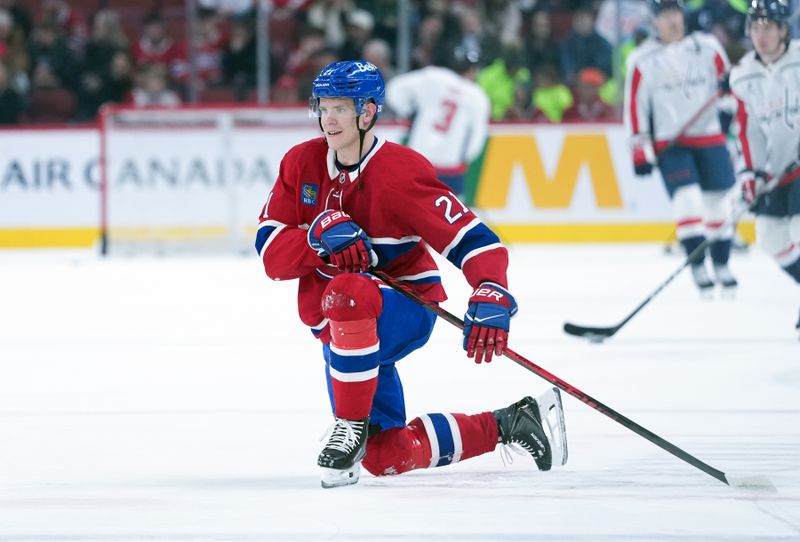Feb 28, 2026; Montreal, Quebec, CAN; Montreal Canadiens defenseman Kaiden Guhle (21) stretches during the warmup before the game against the Washington Capitals at the Bell Centre. Mandatory Credit: Eric Bolte-Imagn Images