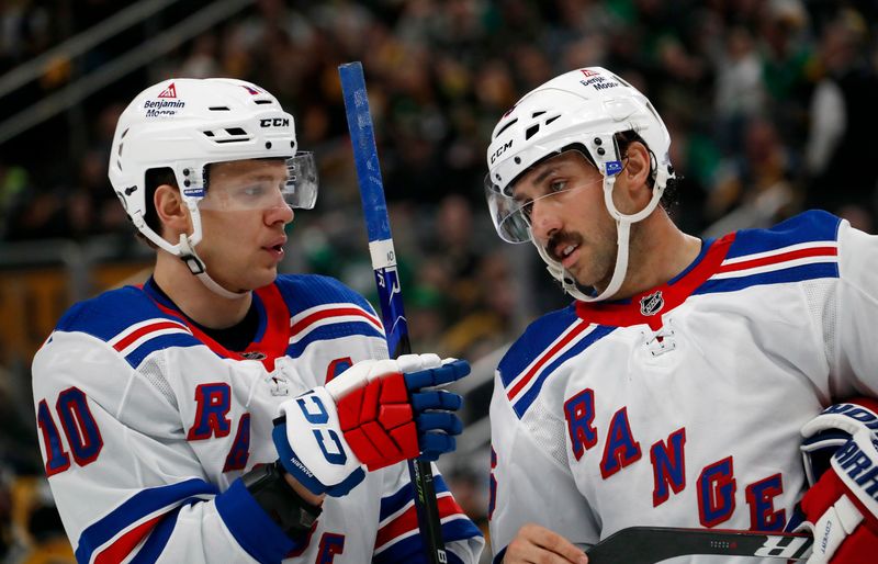 Mar 16, 2024; Pittsburgh, Pennsylvania, USA;  New York Rangers left wing Artemi Panarin (10) talks to center Vincent Trocheck (16) against the Pittsburgh Penguins during the second period at PPG Paints Arena. Mandatory Credit: Charles LeClaire-USA TODAY Sports