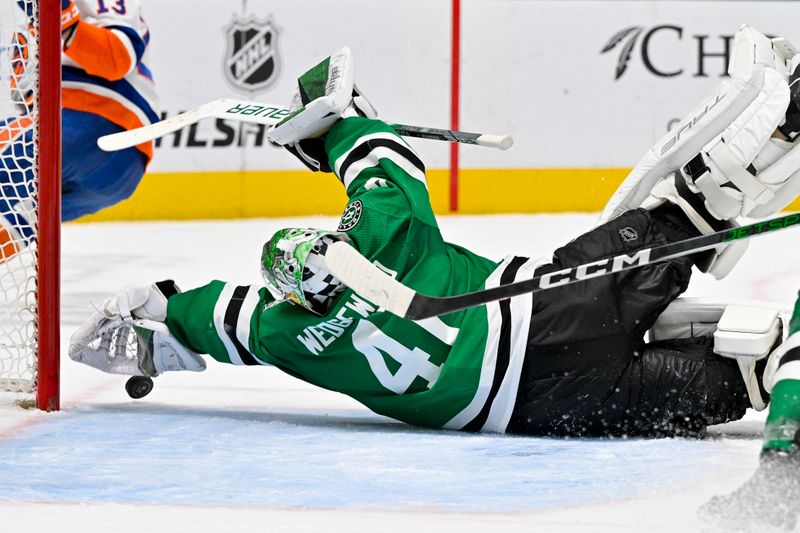 Feb 26, 2024; Dallas, Texas, USA; Dallas Stars goaltender Scott Wedgewood (41) stops a shot by New York Islanders center Mathew Barzal (not pictured) during the third period at the American Airlines Center. Mandatory Credit: Jerome Miron-USA TODAY Sports