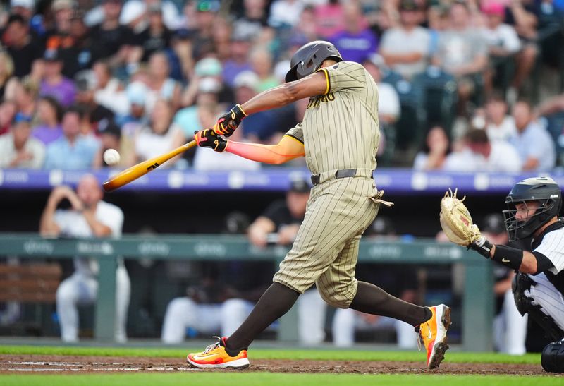 Aug 16, 2024; Denver, Colorado, USA; San Diego Padres second base Xander Bogaerts (2) hits a solo home run in the fourth inning against the Colorado Rockies at Coors Field. Mandatory Credit: Ron Chenoy-USA TODAY Sports