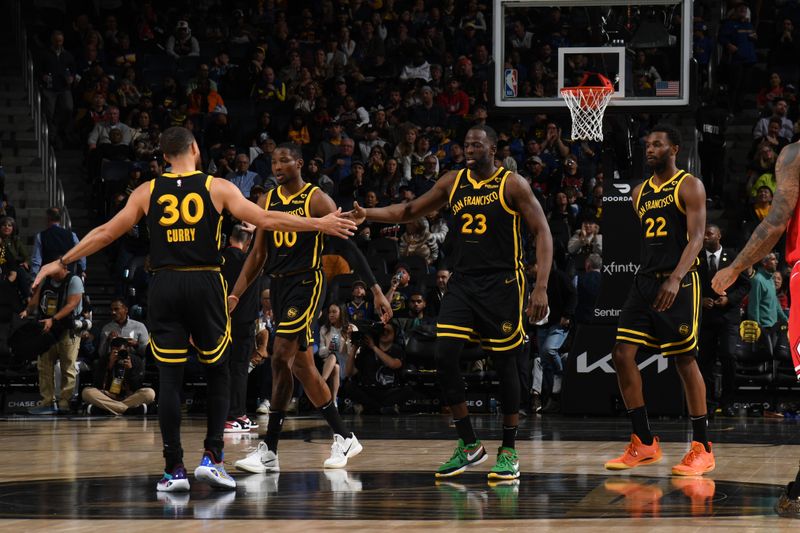 SAN FRANCISCO, CA - MARCH 7: Stephen Curry #30 high fives  Draymond Green #23 of the Golden State Warriors during the game against the Chicago Bulls on March 7, 2024 at Chase Center in San Francisco, California. NOTE TO USER: User expressly acknowledges and agrees that, by downloading and or using this photograph, user is consenting to the terms and conditions of Getty Images License Agreement. Mandatory Copyright Notice: Copyright 2024 NBAE (Photo by Noah Graham/NBAE via Getty Images)