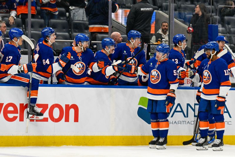 Jan 6, 2026; Elmont, New York, USA; New York Islanders center Casey Cizikas (53) celebrates his goal against the New Jersey Devils  during the third period at UBS Arena. Mandatory Credit: Dennis Schneidler-Imagn Images