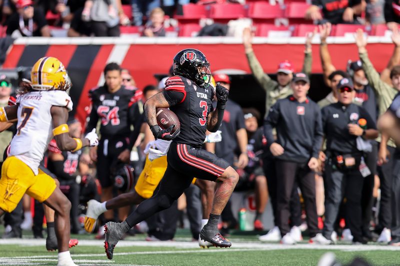 Nov 4, 2023; Salt Lake City, Utah, USA; Utah Utes running back Ja'Quinden Jackson (3) runs for a touchdown against the Arizona State Sun Devils in the third quarter at Rice-Eccles Stadium. Mandatory Credit: Rob Gray-USA TODAY Sports