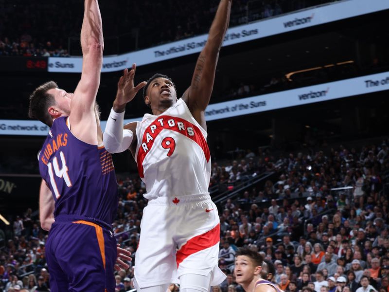 PHOENIX, AZ - MARCH 7: RJ Barrett #9 of the Toronto Raptors drives to the basket during the game against the Phoenix Suns on March 7, 2024 at Footprint Center in Phoenix, Arizona. NOTE TO USER: User expressly acknowledges and agrees that, by downloading and or using this photograph, user is consenting to the terms and conditions of the Getty Images License Agreement. Mandatory Copyright Notice: Copyright 2024 NBAE (Photo by Jeff Haynes/NBAE via Getty Images)