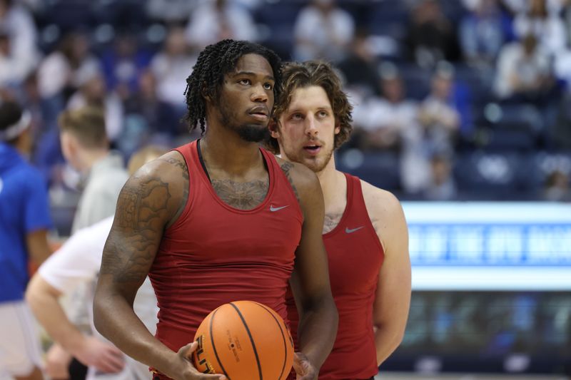 Jan 16, 2024; Provo, Utah, USA; Iowa State Cyclones forward Tre King (0) and forward Conrad Hawley (23) warms up before the game against the Brigham Young Cougars at Marriott Center. Mandatory Credit: Rob Gray-USA TODAY Sports