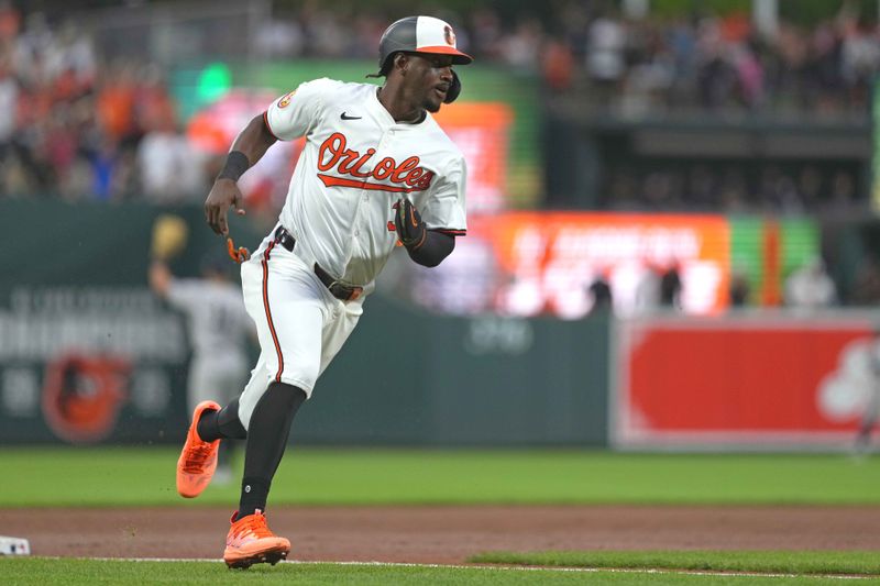 Apr 30, 2024; Baltimore, Maryland, USA; Baltimore Orioles second baseman Jorge Mateo (3) rounds third base to score in the fourth inning on a double by catcher James McCann (not shown) against the New York Yankees at Oriole Park at Camden Yards. Mandatory Credit: Mitch Stringer-USA TODAY Sports